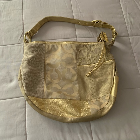 Coach Handbags - Coach Gold Logo Bag